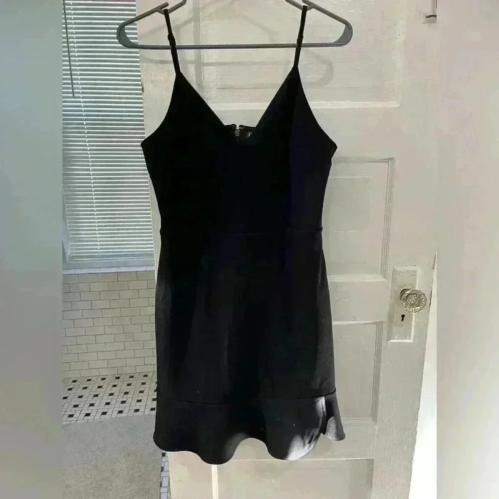 Express black spaghetti strap ruffled bottom dress size medium‎